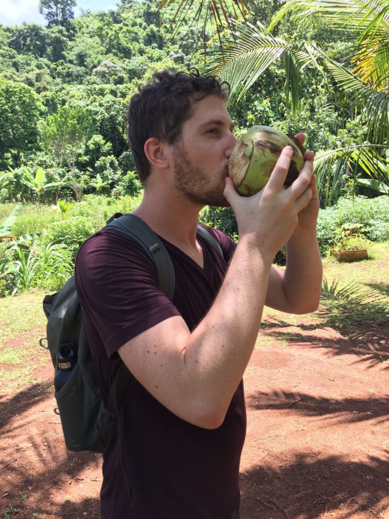 refreshing coconut milk while hiking in Fiji